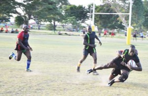 GRFU 10s’ champions Hornets and University  of Guyana seen in action yesterday.