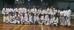  Participants of the GKF National Championships pose with President Amir Khouri (centre with tie) following the conclusion of their nationals. 