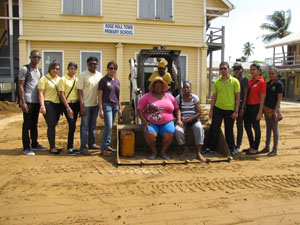Demerara Bank employees, teachers and PTA Members after the project.