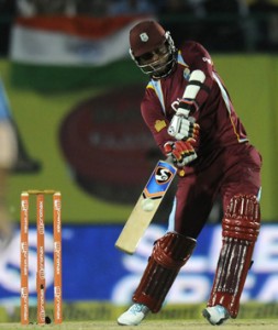 Marlon Samuels carves one over the infield. (BCCI)