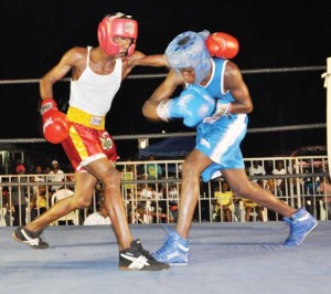 Jamal Eastman (right) successfully ducks from a vicious Ceon Griffith punch 