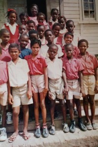 Most memorable years: Posing (in the background) with some of her students at the All Saints’ Primary School.