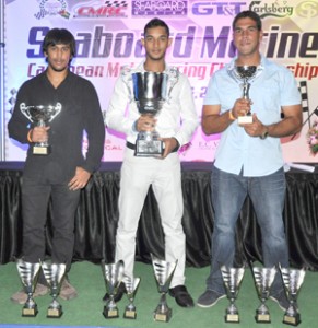 The kings of the Caribbean (from left)- Superbike champion Nikhil Seereeram, Group 4 and overall champion Kristian Jeffrey and Group 2 champion Mark Thompson pose for a photo op with their hardware..