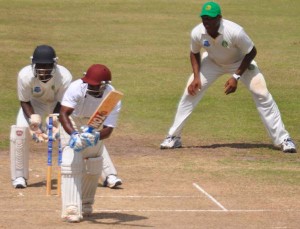 Devon Smith gathers leg-side runs in a losing cause for the Volcanoes yesterday.