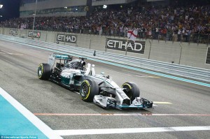 Hamilton punched the air, taking both hands off his steering wheel as he took his 11th win of the season to put him 67 points ahead of team mate, rival and friend Nico Rosberg. (International Sports Fotos)