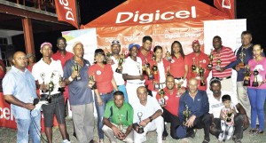 Prize winners pose with their hardware following the conclusion of the presentation ceremony last evening at the Lusignan Golf Course.