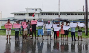 Protesters in front of the Leonora Police Station.
