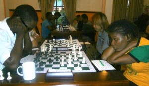 Wendell Meusa (left) studies his next move while Debra Richards plots her response.