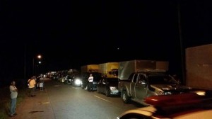 Long lines of vehicles and frustrated commuters along the Berbice River Bridge Road Eastern End at Crab Island last evening.