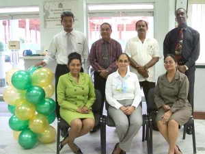 Longstanding employees and senior staffers of Demerara Bank yesterday during the start of the 20th Anniversary celebrations.
