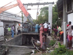 The door of the Sussex Street koker being closed with the use of an excavator. 