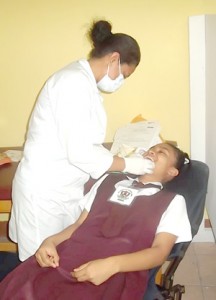 A student of the Campbellville Secondary School gets a dental check-up 