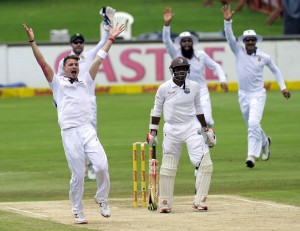 Dale Steyn celebrates after getting Shivnarine Chanderpaul out caught behind. (AFP)