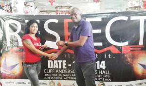 Director at Respect the Game Inc., Surika Danraj (left) receives the sponsorship cheque from Manager at the Footsteps Mega Store, Lester Gilhuys.