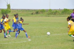 (Flashback)-Players from the two schools battle for possession of the ball in their encounter last week. 