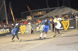 Part of the action in the quarter-final clash between Leopold Street and West Front Road on Sunday, at Demerara Park. 