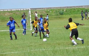 Part of yesterday’s action in the Ministry of Health / Health 2000Inc / Ministry of Education / Ansa McAl Girls Schools Football Competition.