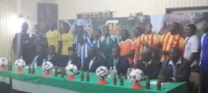 Teams’ representatives, UDFA officials and Banks DIH Brand Manager Errol Nelson (3rd right sitting) seen at the Launch on Saturday at Watooka Complex.