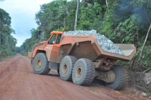 A truck with stones along the Amaila Falls hydro road.