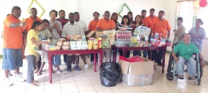 The Enterprise Road Safety Association is not all about what happens on our roads. Yesterday they embarked on another side of their community-oriented campaign when they donated $150,000 in much needed supplies to the Cheshire Home at Mahaica, ECD. In photo, members of the Association pose with nurses and residents of the Home after making their Christmas donation.     