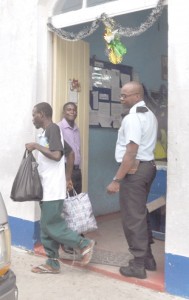 Triple murder accused Jerome Franklyn is led  from the Vreed en Hoop Police Station lock-ups to prison. 