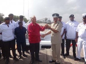 Minister Rohee hands over the boat keys to Police Commissioner (Ag) 
