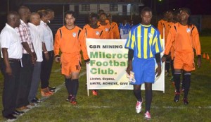 Milerock Football Club during the march past at the opening ceremony of the Upper Demerara GT Beer Supa 16 football tournament. 