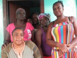 The distraught family of Bertrand Pollard. His mother Wilhemina Robertson is in pink top with head tie.