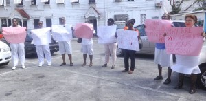 Nurses protest in solidarity with colleagues, Sharon Chase (left) and Shandra Hanover (second from left)