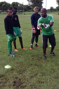 Andrew Hazel (right) during one of the sessions with the goalkeepers from left, Rondell Allen, Derville Stuart and Romario James.   