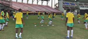 The Golden Jaguars getting warmed up for the task at hand during their first session yesterday at the Stadium.  