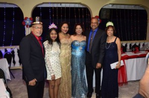 President Donald Ramotar, and First Lady Deolatchmee Ramotar with Police Commissioner (Ag) Seelall Persaud and his family at Eve Leary.