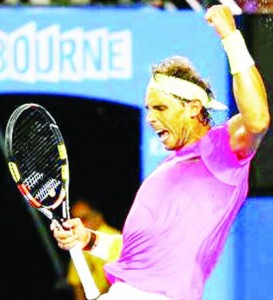 Rafael Nadal of Spain celebrates after defeating Dudi Sela of Israel in their men’s singles third round match at the Australian Open 2015 tennis tournament in Melbourne January 23, 2015. REUTERS-Issei Kato