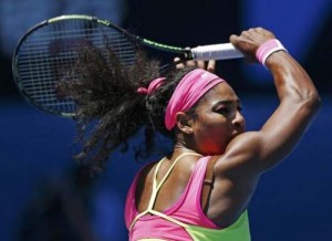 Serena Williams of the U.S. hits a return to Dominika Cibulkova of Slovakia during their women’s singles quarter-final match at the Australian Open 2015 tennis tournament in Melbourne January 28.  REUTERS/Athit Perawongmetha