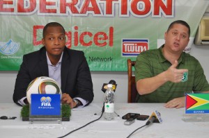 GFF NC Chairman Clinton Urling (left) listens attentively as new GFF  TD Claude Bolton makes a point during yesterday’s press conference. 