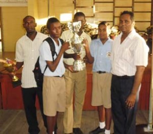 The winners, Team ‘B’ of New Amsterdam Secondary (NAMS)  and Mr. Dhanraj (right), Head Teacher of NAMS. 