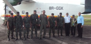 Special Forces ranks with GCAA officials at Timehri yesterday