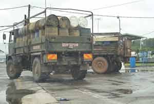 A truck with fuel drums at Rubis Gas Station, Providence.