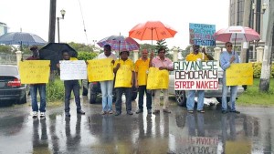 The AFC protestors outside the US Embassy, Kingston, Georgetown.