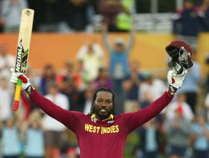 Chris Gayle soaks in the applause after surging to a double.