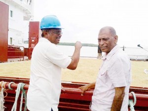 Agri Minister, Dr. Leslie Ramsammy (right)  and GRDB’s GM, Jagnarine Singh