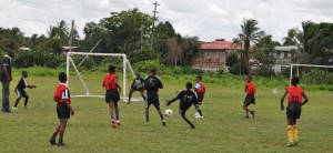 Agricola Red Triangle in attack mode against Diamond United yesterday at the Grove ground.  
