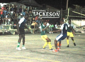 Plantain All-Stars on the attack during the Mackeson NEE Mashramani Futsal tournament at the MSC Hard Court in Linden.