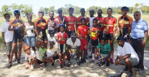 he respective winners and other top performers from yesterday’s Meet pose with race officials following the presentation.  