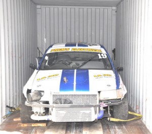 Rameeze Mohamed’s Toyota Starlet being loaded into the container for shipping to Jamaica.