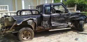 The mangled pick-up truck    