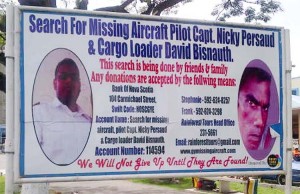 The sign board erected to garner assistance to continue search efforts for the missing ASL crew