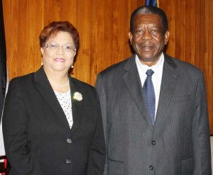 Mme. Justice Rajnauth- Lee and Sir Dennis Byron, president of the Caribbean Court of Justice after the swearing in. 