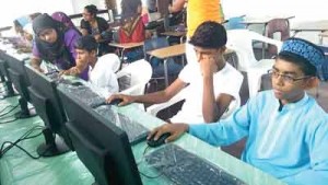 Youths actively engaged on the computers after the commissioning.