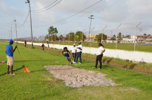 Chantoba Bright descends into the Long Jump pit at GDF Ground on her way to qualifying for the 2015 CARIFTA Games yesterday.